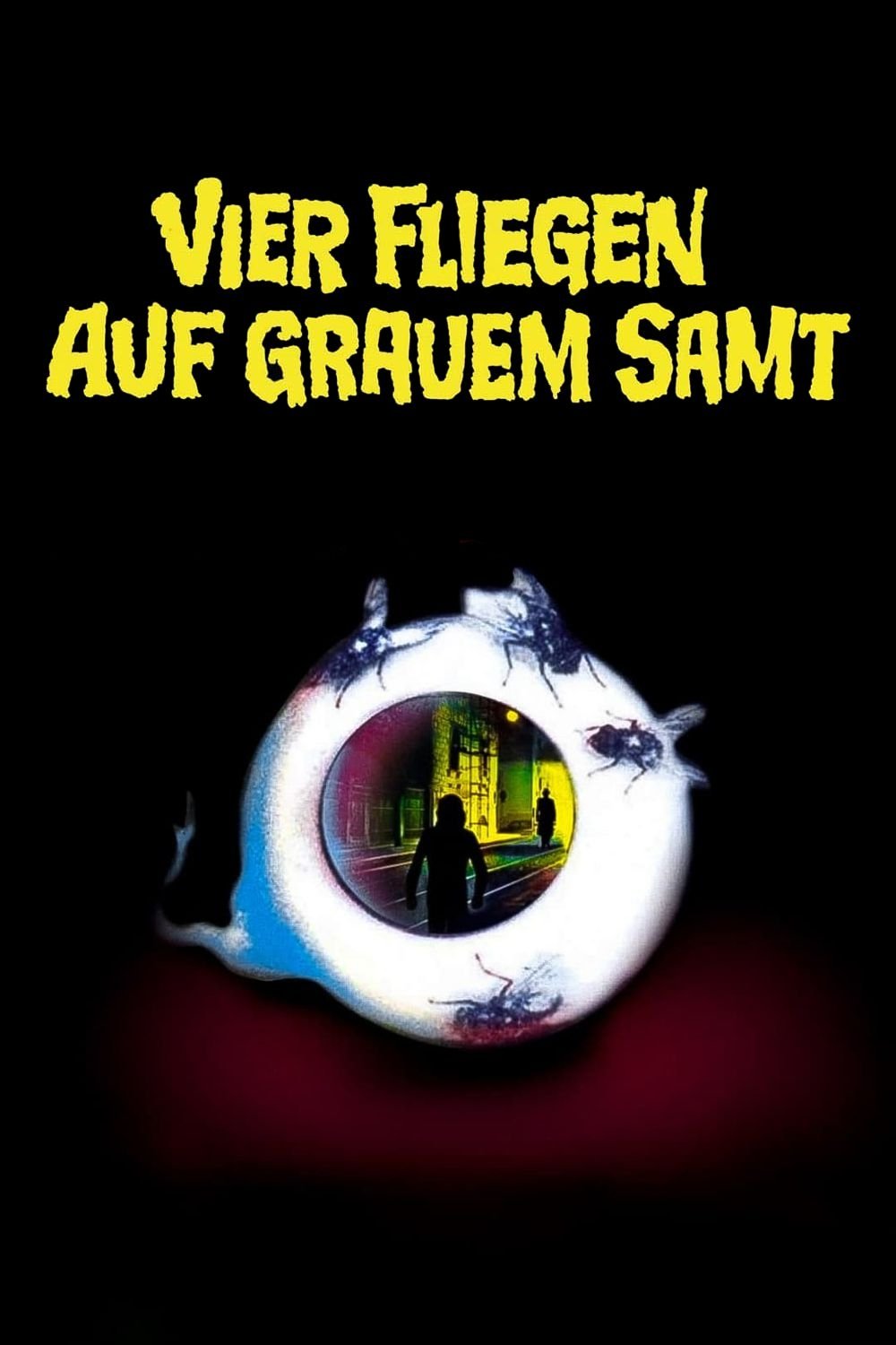 Vier Fliegen auf grauem Samt